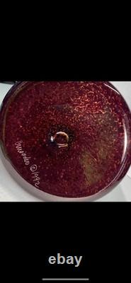 Art glass vase with tortoiseshell pattern and blue rim by Crusader Glass