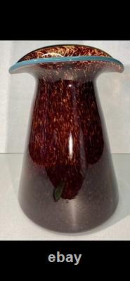 Art glass vase with tortoiseshell pattern and blue rim by Crusader Glass