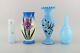 Four antique vases in hand-painted mouth-blown opal art glass
