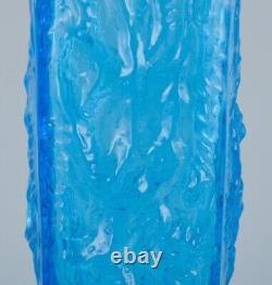 Gullaskruf, Sweden. Square-shaped glass vase and candlestick in blue art glass