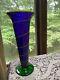 Hand blown Cobalt Blue glass vase with fused yellow swirls & green glass base