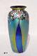 Iridescent Blue Vase WithTree Design. By Saul Alcaraz. Blown Glass