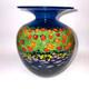 Ken and Ingrid Hanson Millefiori Poppy Vase 7.5 Blue & Iridescent Background