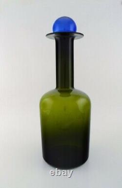 Otto Brauer for Holmegaard. Large vase / bottle in green art glass
