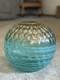 Spherical blown vase (Murano, 1950s, Turquoise color withadventurine inclusion)