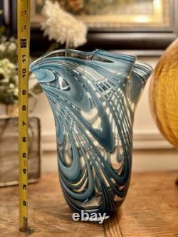 Vintage Hand Blown art glass vase with blue and white swirls. 11 Inches Tall