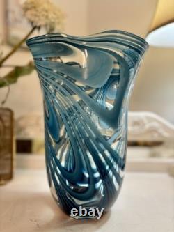 Vintage Hand Blown art glass vase with blue and white swirls. 11 Inches Tall